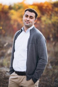 young-handsome-man-outside-autumn-park